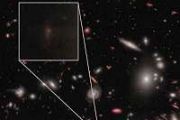 Mysterious 'red dots' in early universe may be 'black hole star' atmospheres